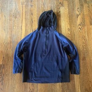 Nike Tech half-zip sweatshirt.